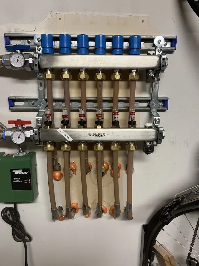 Plumber performing Water Heater Repair at a residential property in Winthrop Harbor